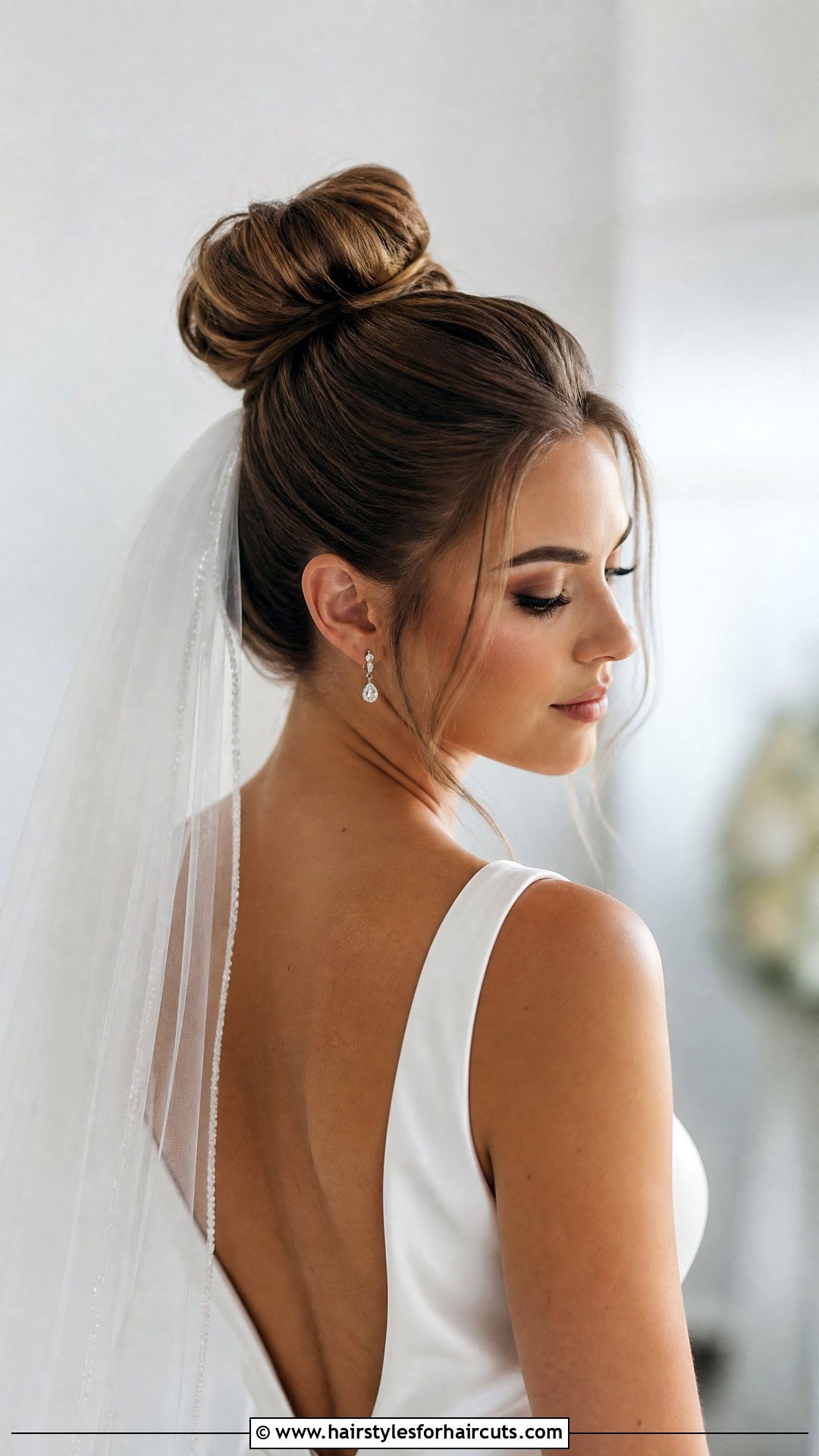 Sleek High Bun Wedding Hairstyle With Veil - 25 wedding hairstyles with veil - 25 wedding hairstyles with veil