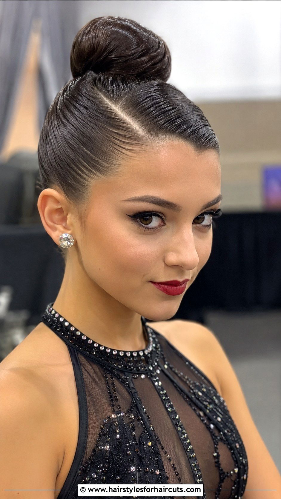 Sleek High Bun With Side Part - 25 dance hairstyles - 25 dance hairstyles