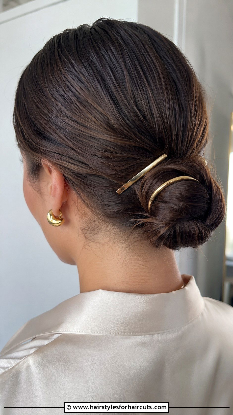 Sleek Low Bun With Gold Clips - 25 hairstyles with hair clips - 25 hairstyles with hair clips