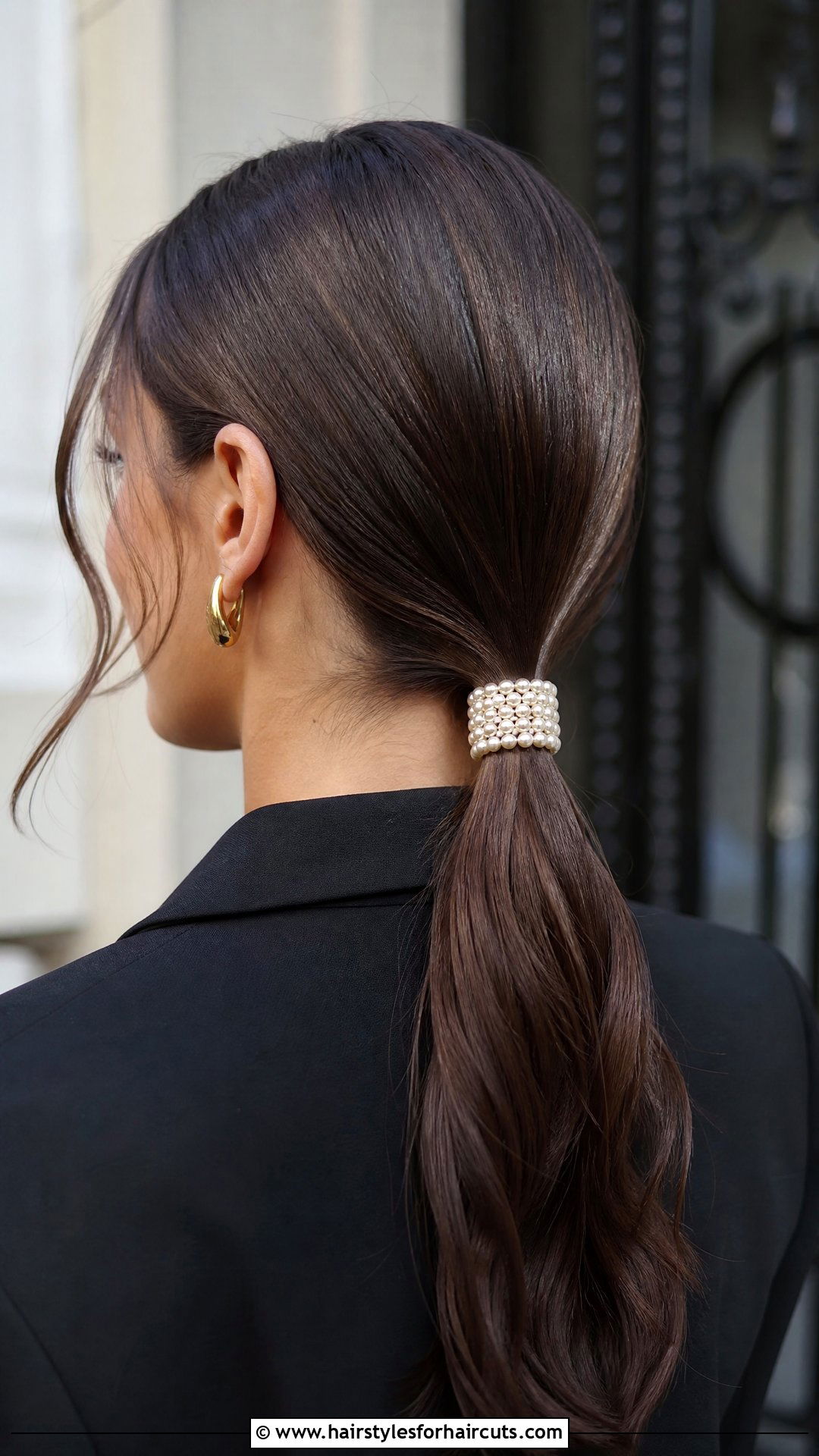 Sleek Low Ponytail With Pearl Accent - 25 pearl hairstyles - 25 pearl hairstyles