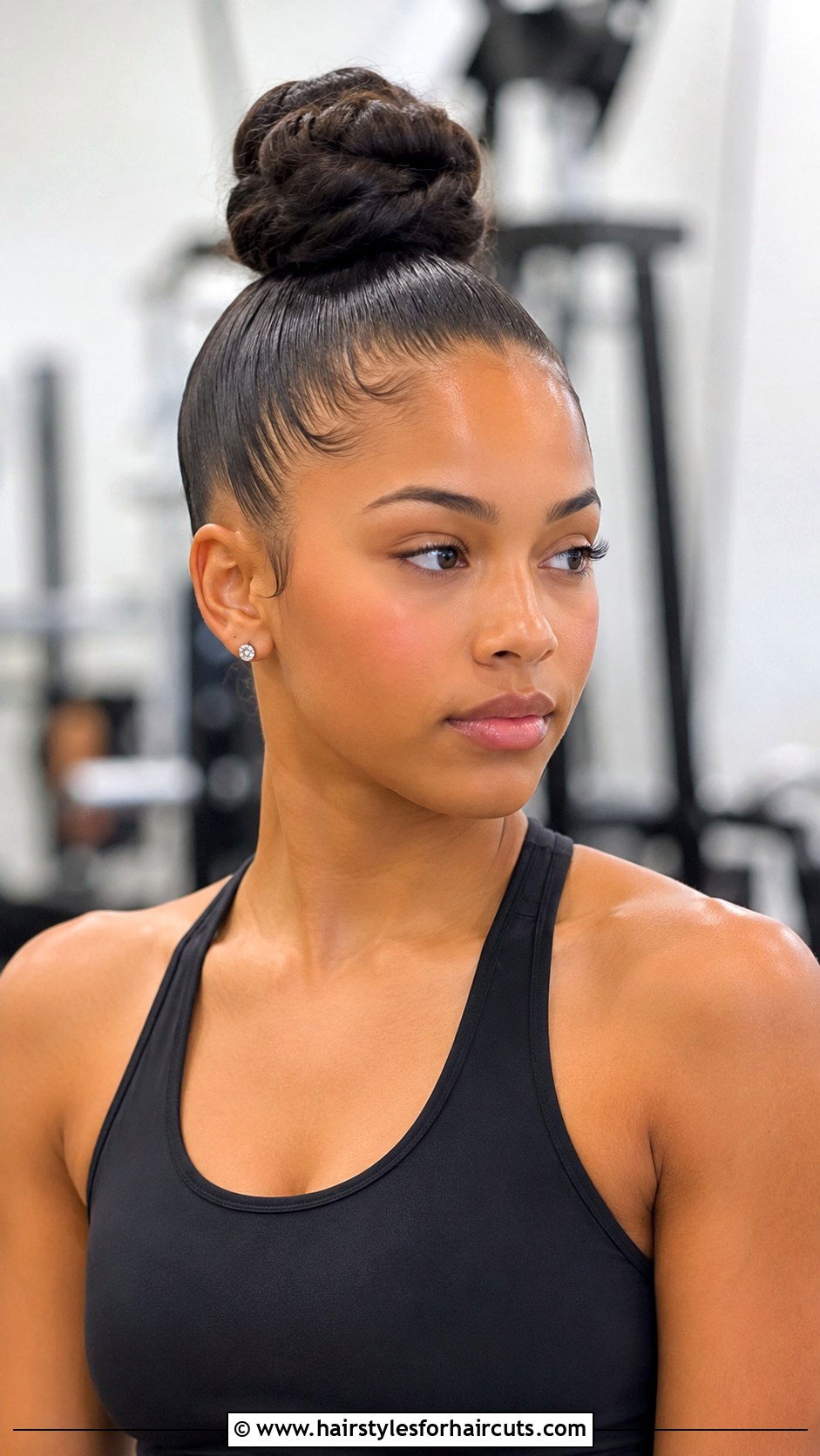 Sleek Top Knot - 25 cheer hairstyles - 25 cheer hairstyles