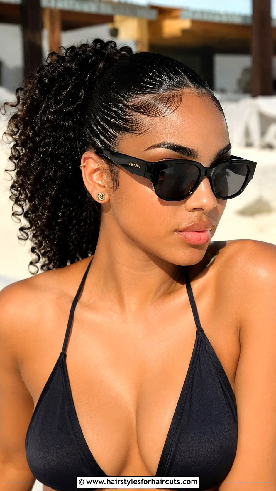 Slicked Back Curly Beach Ponytail - 25 curly hair beach hairstyles - 25 curly hair beach hairstyles