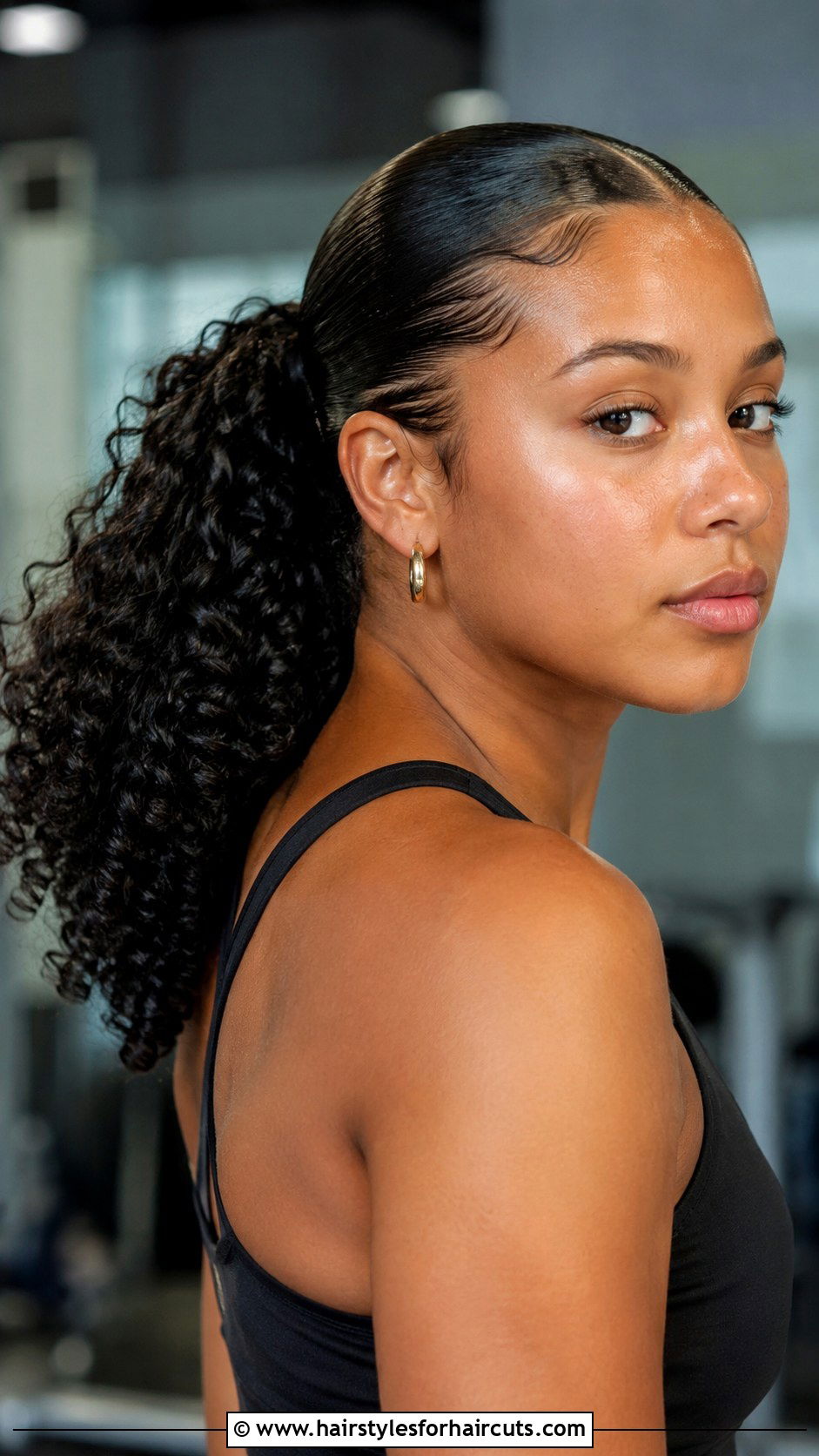 Slicked Back Curly Ponytail - 25 curly hairstyles - 25 curly hairstyles