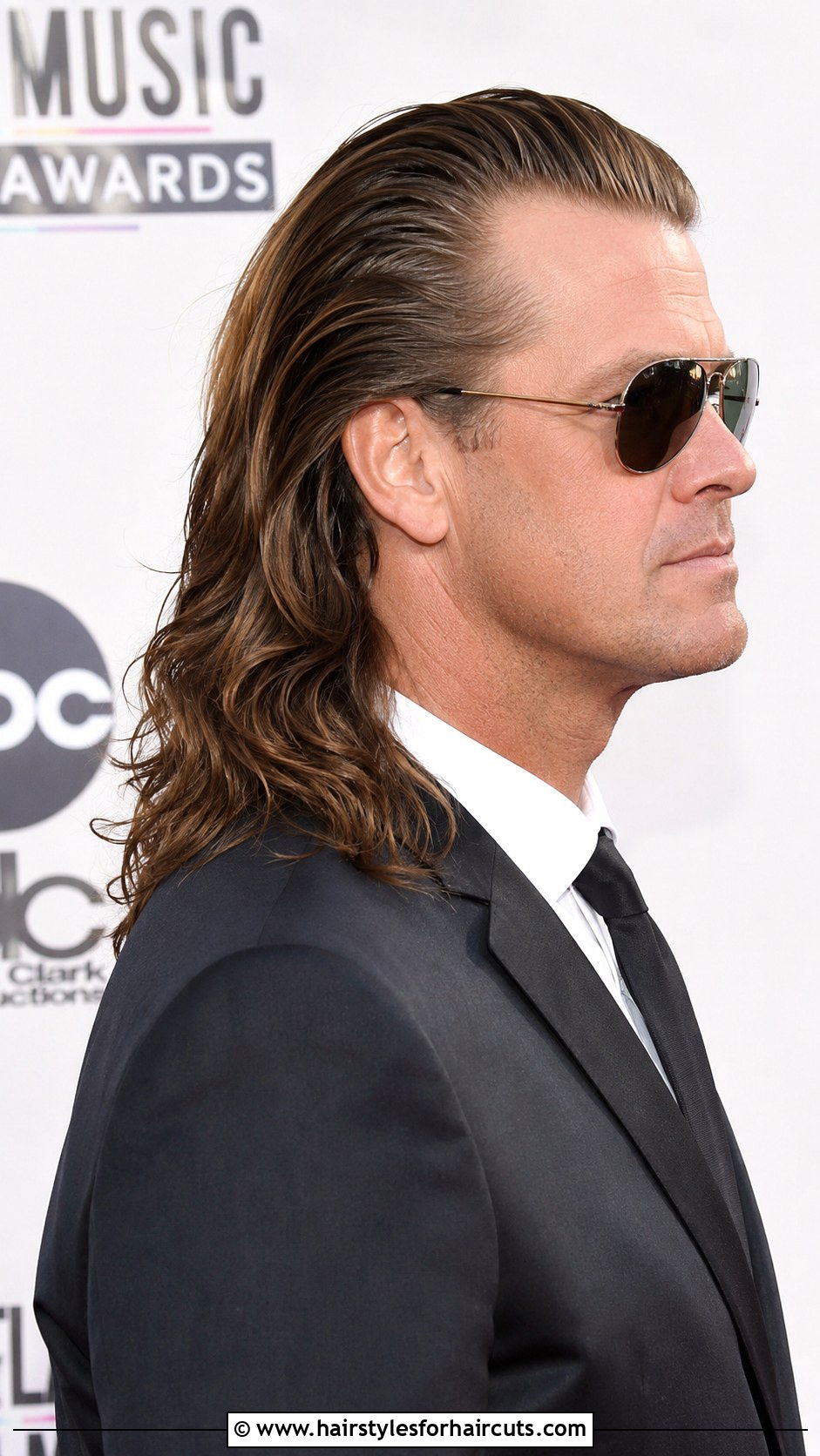 Slicked Back Glam Metal Sweep - 25 80s hair metal hairstyles - 25 80s hair metal hairstyles