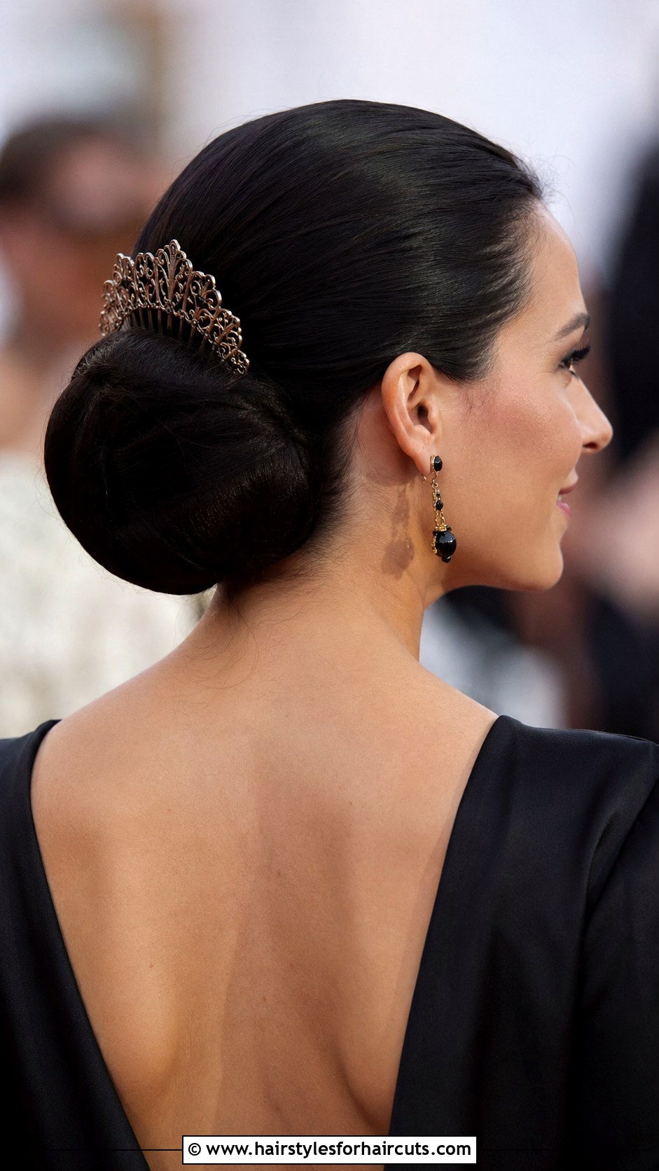 Spanish Style Low Bun - 25 cinco de mayo hairstyles - 25 cinco de mayo hairstyles