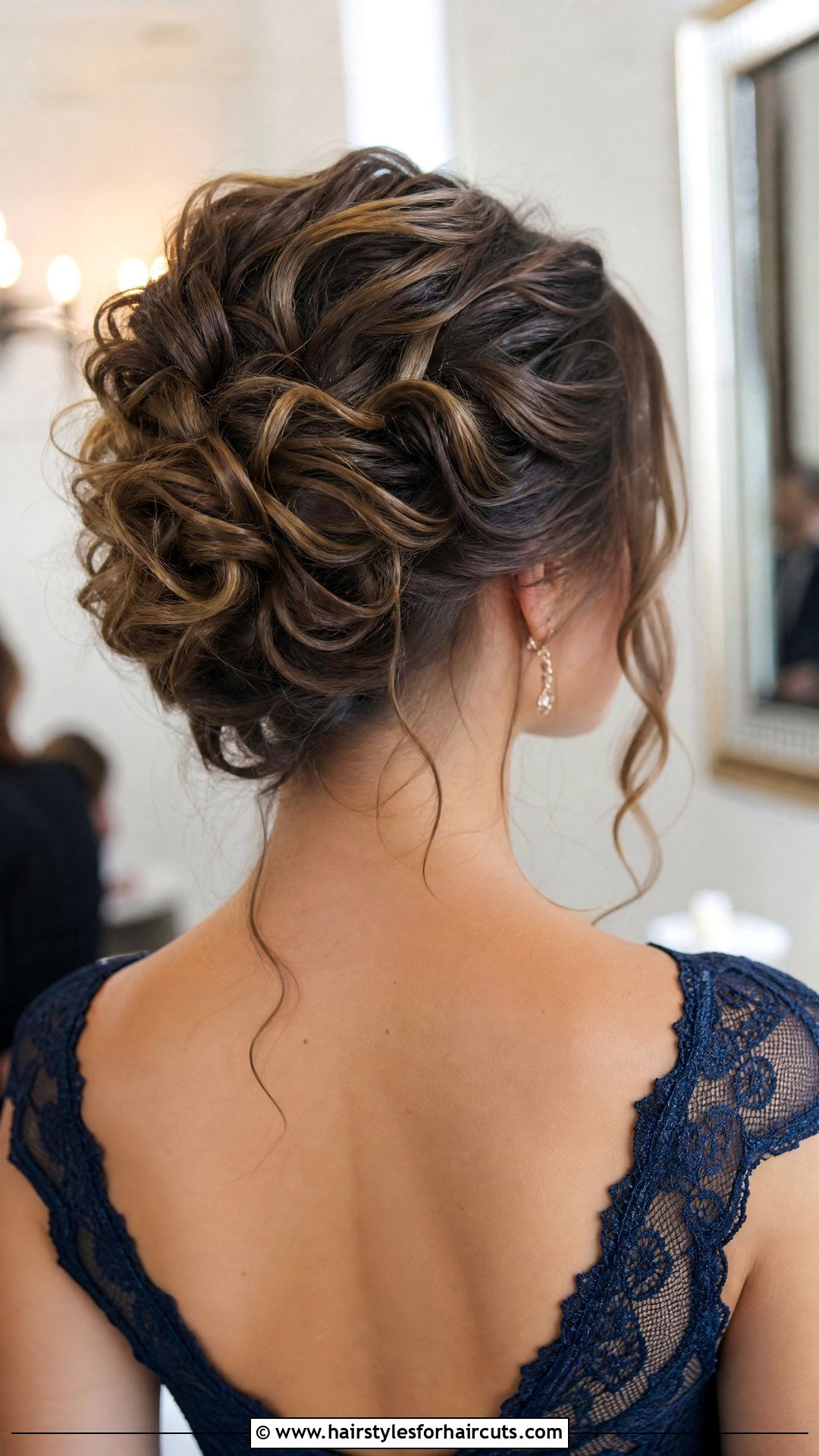 Stacked Curly Bun Updo - 25 updo hairstyles for curly medium length hair - 25 updo hairstyles for curly medium length hair
