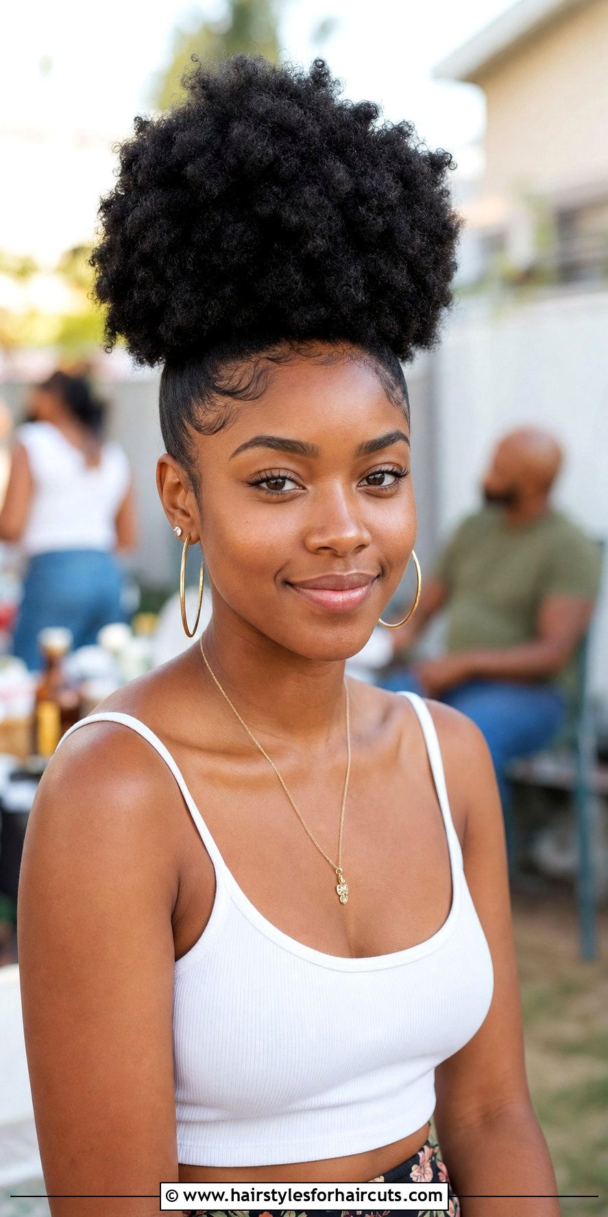 Stretched Afro Puff - 25 stretched natural hairstyles - 25 stretched natural hairstyles