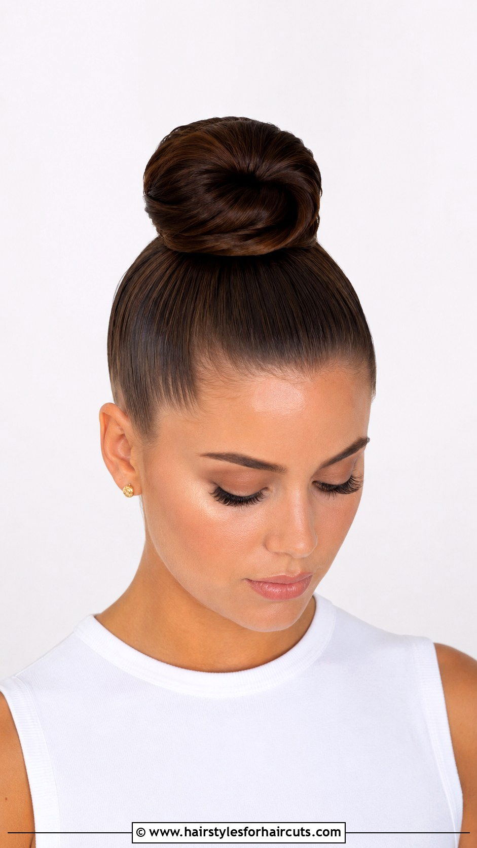 Structured Top Knot Updo - 25 50s updo hairstyles for long hair - 25 50s updo hairstyles for long hair