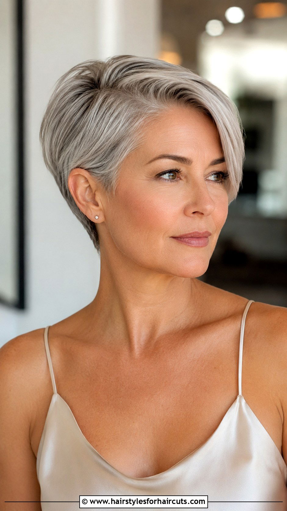 Sweeping Side Part Grey Pixie - 25 grey hair short haircuts - 25 grey hair short haircuts