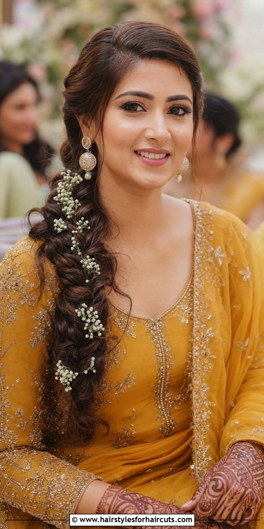 Swooping Side Braid With Baby Breath Flowers - 25 modern indian wedding hairstyles for long hair - 25 modern indian wedding hairstyles for long hair