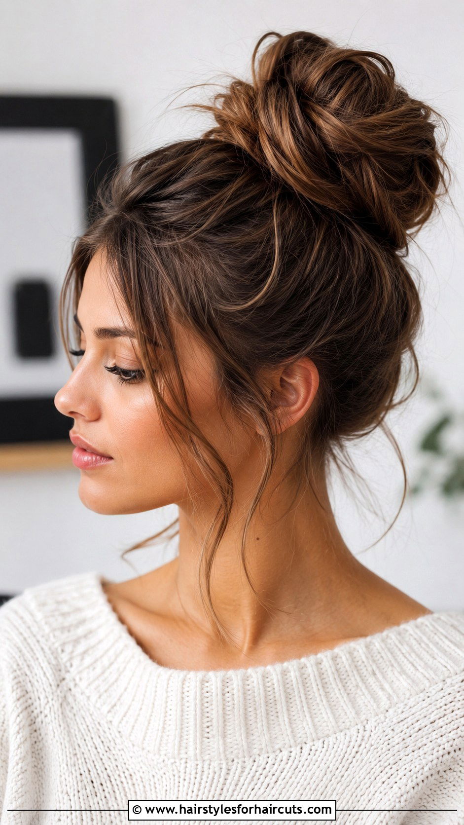 Textured High Bun With Loose Strands - 25 thanksgiving hairstyles for long hair - 25 thanksgiving hairstyles for long hair