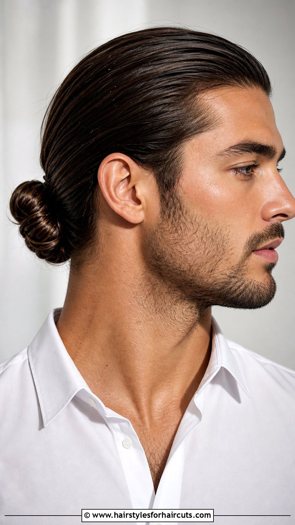 Tied Back Low Bun Men - 25 long hair stud haircuts - 25 long hair stud haircuts