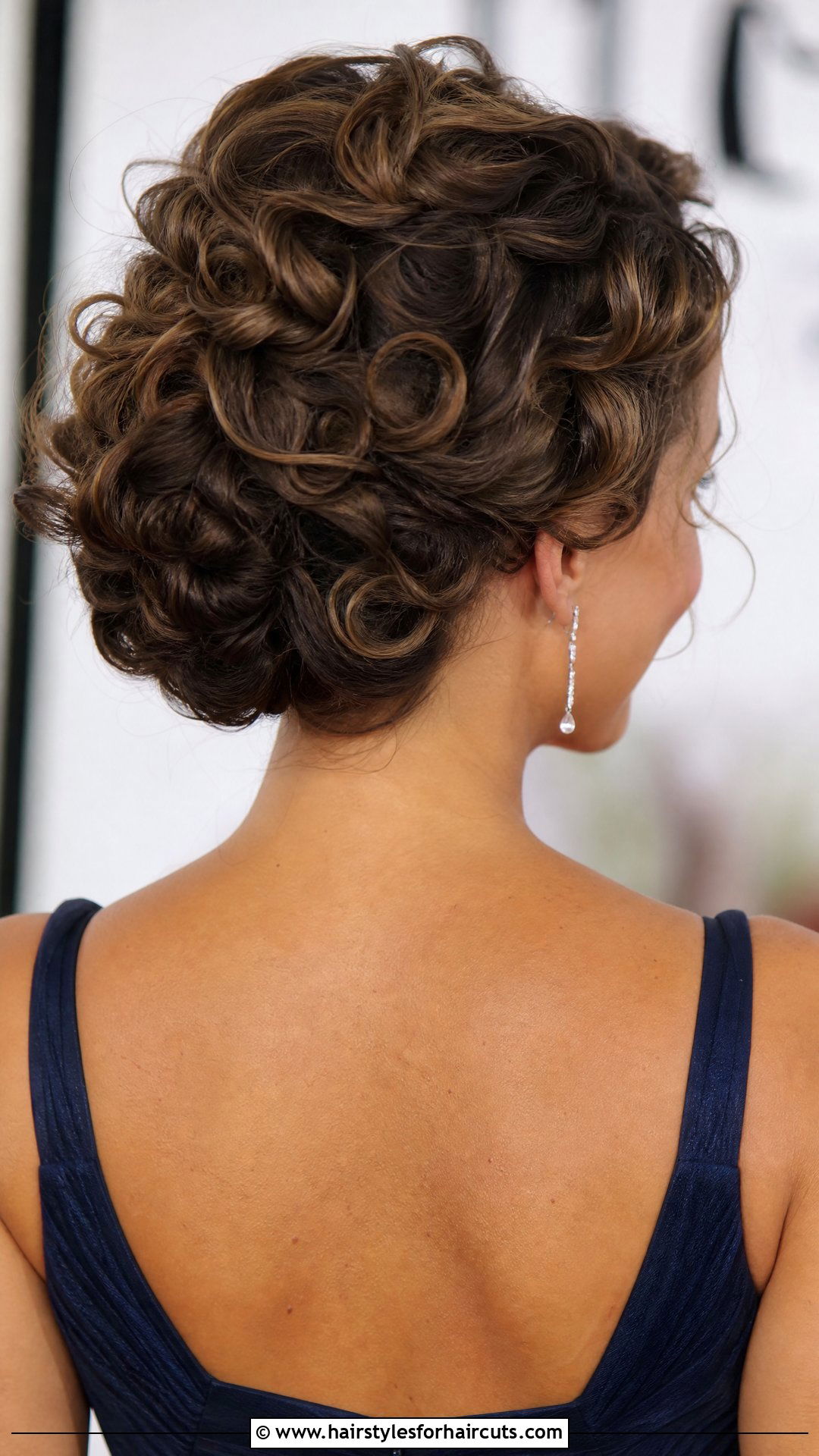 Tucked Curly Updo Hairstyle - 25 woman curly hairstyles - 25 woman curly hairstyles