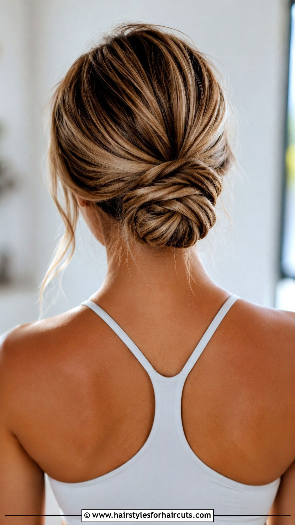 Twisted Low Bun - 25 gym hairstyles - 25 gym hairstyles