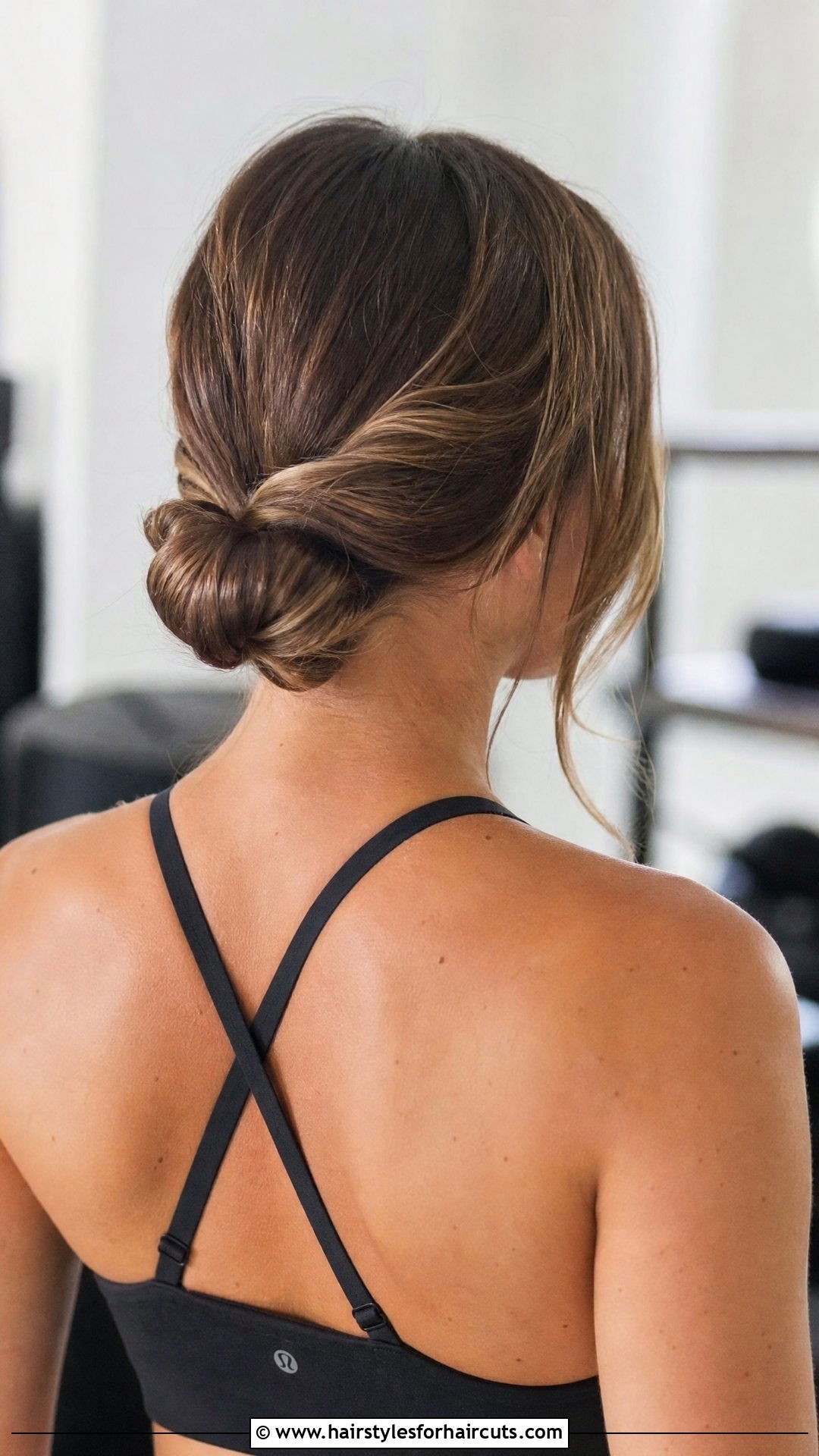 Twisted Low Bun - 25 workout hairstyles that wont damage hair - 25 workout hairstyles that won't damage hair