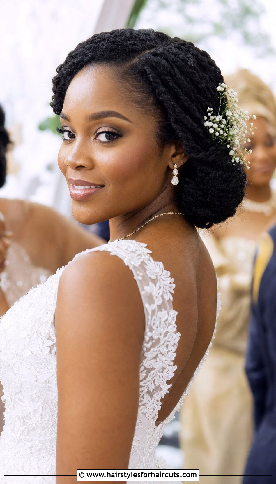Twisted Low Bun With Flowers - 25 low bun hairstyles for black hair wedding - 25 low bun hairstyles for black hair wedding