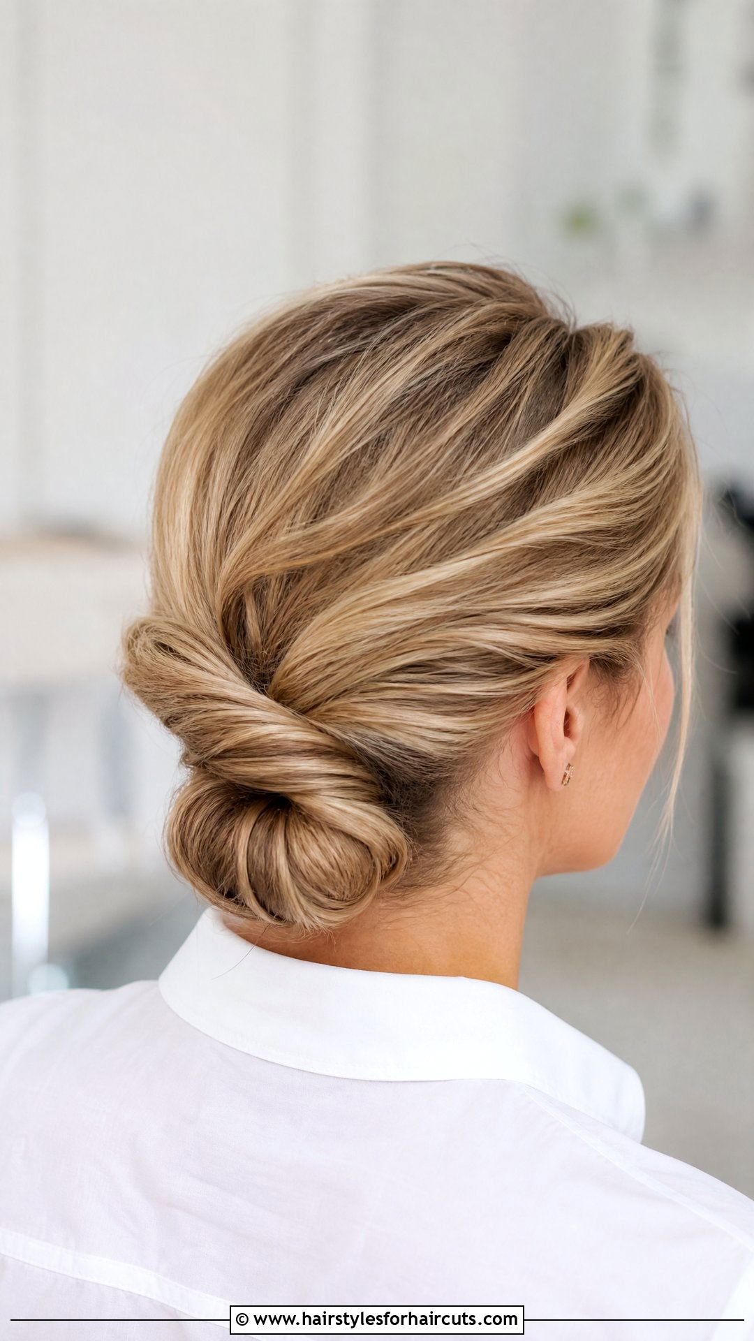 Twisted Low Updo - 25 office hairstyles - 25 office hairstyles
