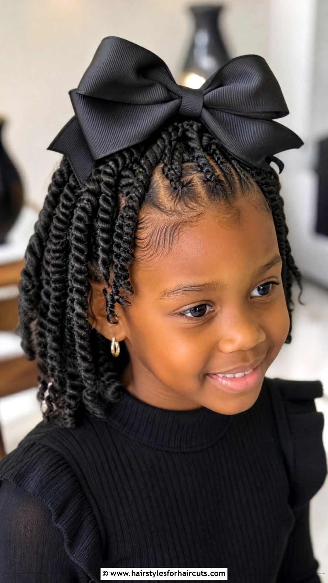 Two Strand Twists With Bow - 25 flower girl hairstyles for black hair - 25 flower girl hairstyles for black hair