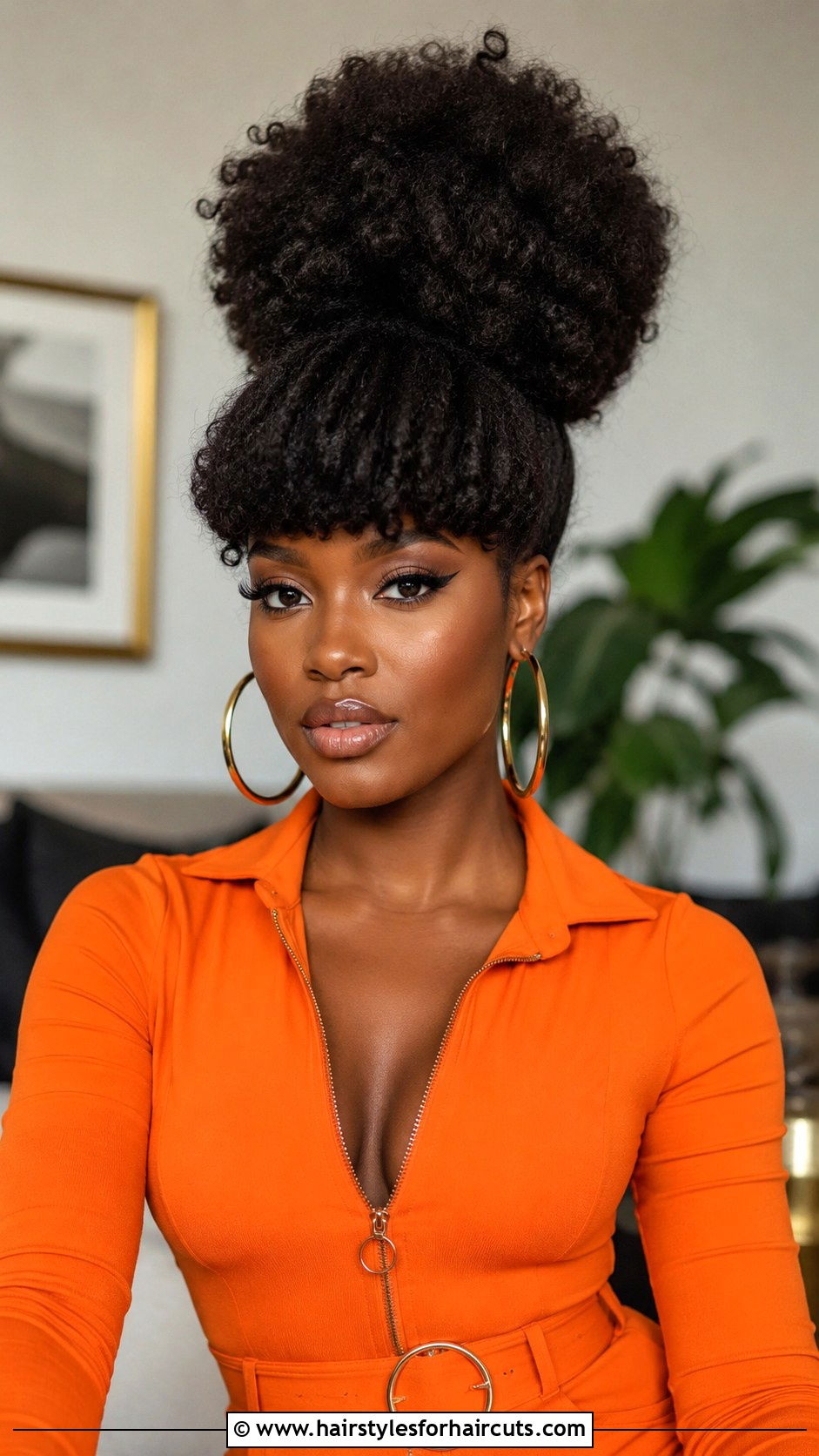 Voluminous Afro Puff With Bangs - 25 pin up hairstyles for black women - 25 pin up hairstyles for black women