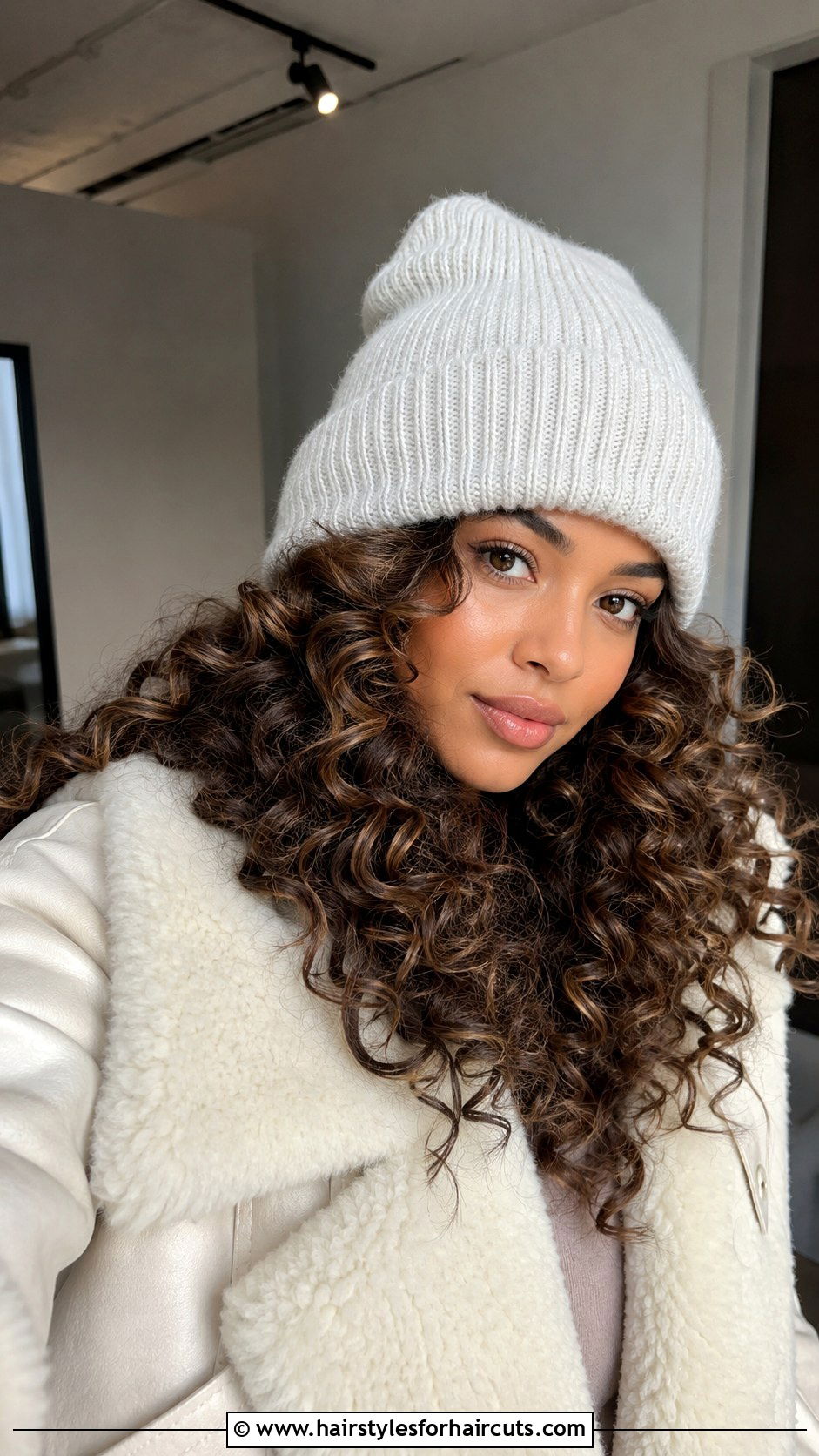 Voluminous Curls Under Beanie - 25 beanie hairstyles for long hair - 25 beanie hairstyles for long hair