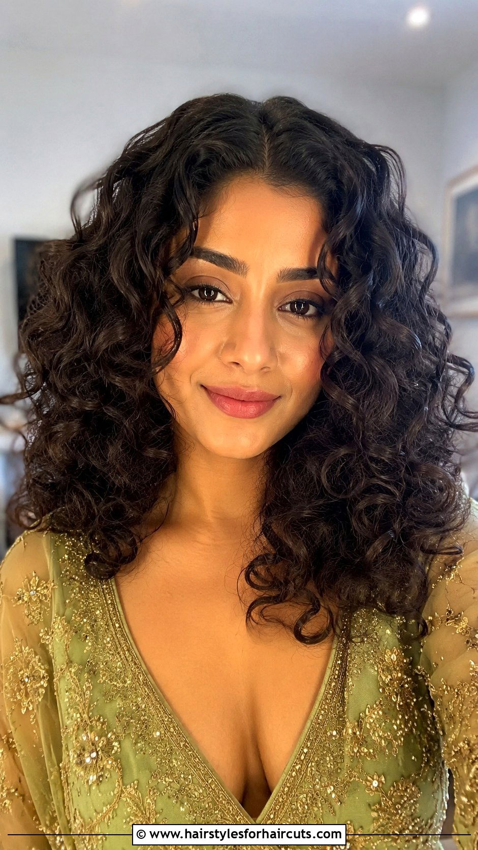Voluminous Curls With Middle Part - 25 thanksgiving hairstyles for long hair - 25 thanksgiving hairstyles for long hair