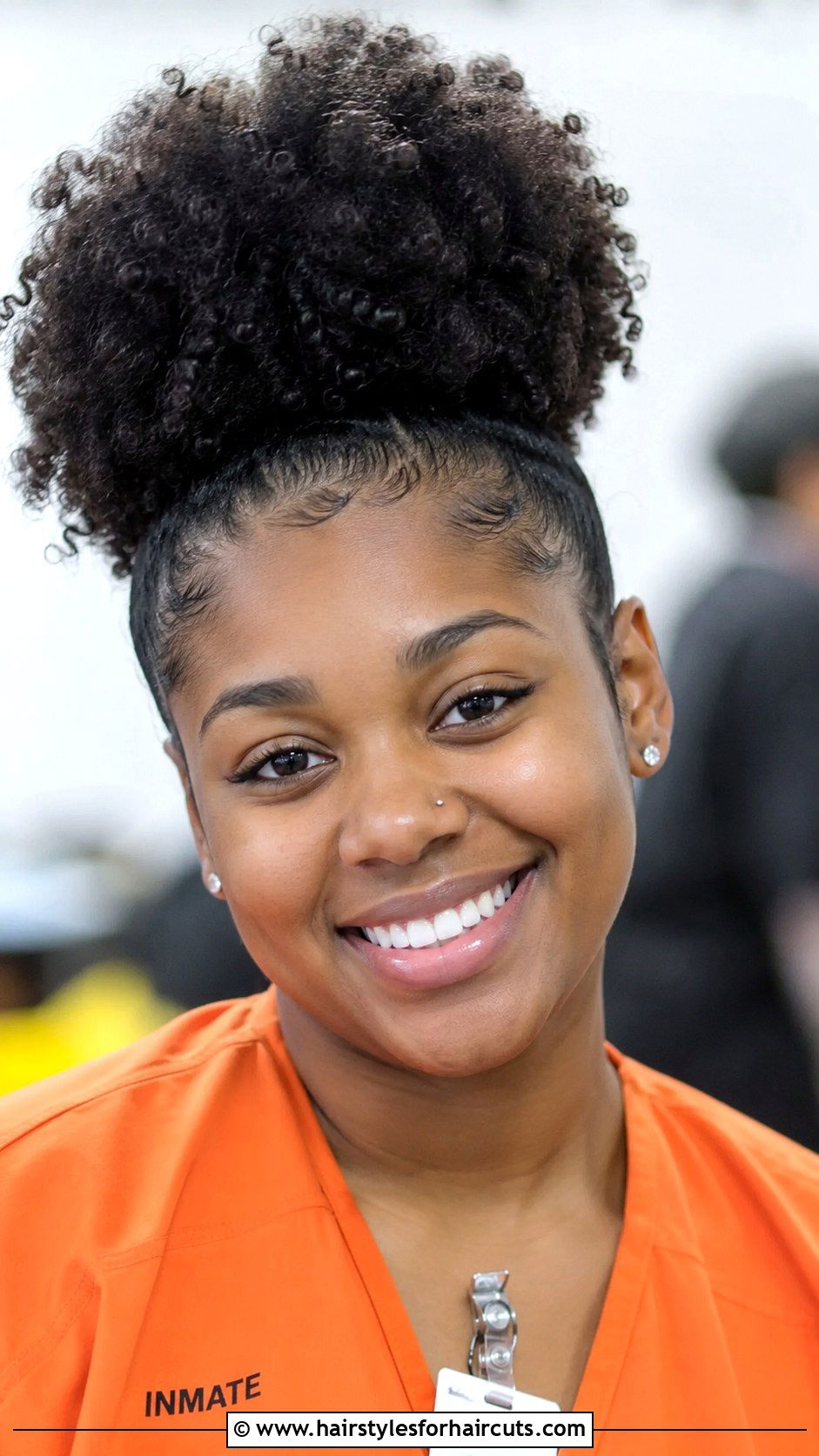 Voluminous Curly Afro Puff - 25 cheerleader hairstyles - 25 cheerleader hairstyles