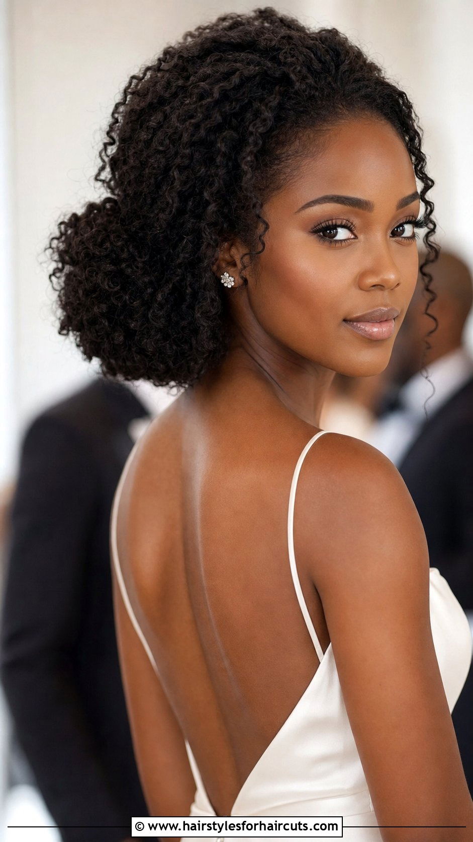 Voluminous Curly Low Bun - 25 low bun hairstyles for black hair wedding - 25 low bun hairstyles for black hair wedding
