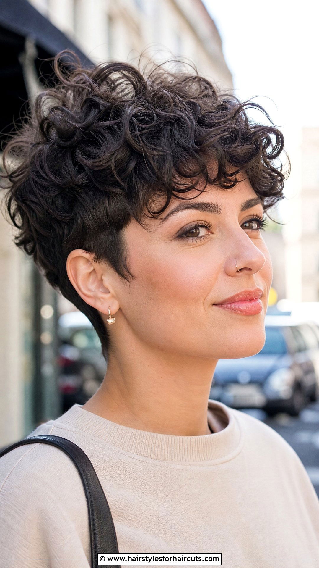 Voluminous Curly Pixie - 25 easy concert hairstyles for short hair - 25 easy concert hairstyles for short hair