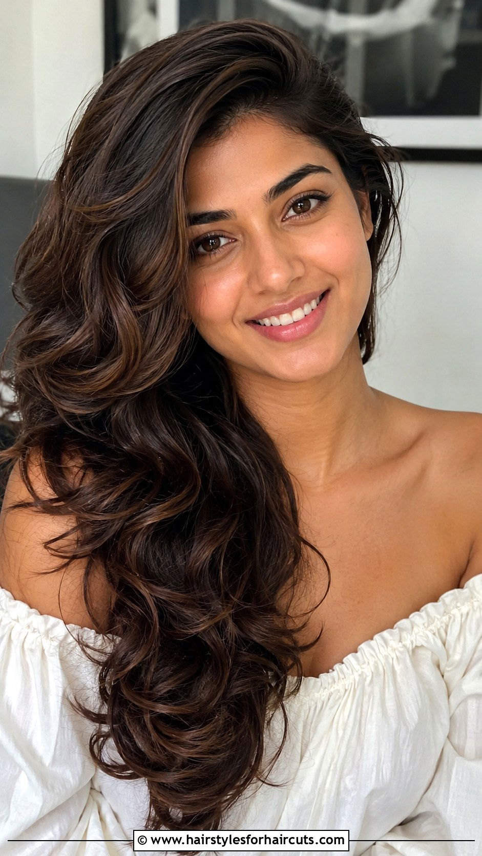 Voluminous Side Swept Curls - 25 long hair christmas hairstyles - 25 long hair christmas hairstyles